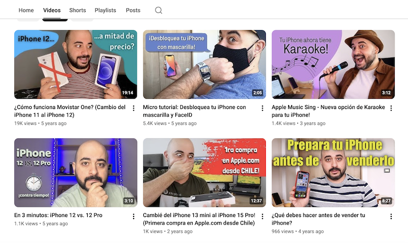 Captura de pantalla de la sección de videos destacados del creador de contenido Jhonny Ayrout. Se muestran las portadas de seis videos coloridos sobre cómo usar funciones de iPhones y tutoriales para usuarios de Apple.

